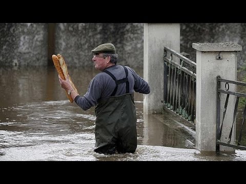 torrential rain brings flooding from paris to prague