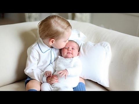 prince george poses with newborn sister charlotte