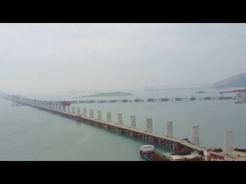 china’s first crosssea railroad bridge takes