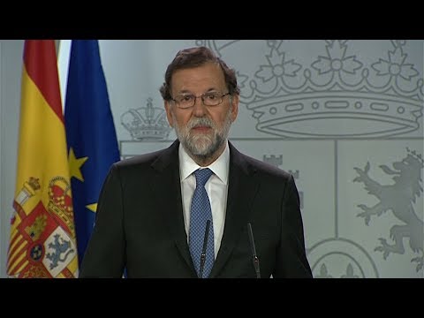 spain formally removes catalan leader and his executive