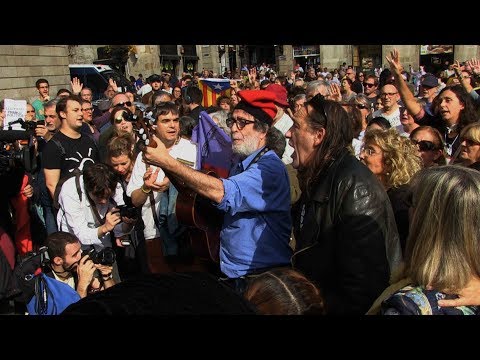 protest in barcelona as spain seeks arrests