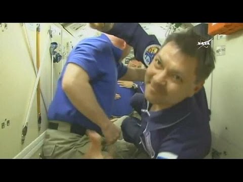 soyuz capsule docks with space station